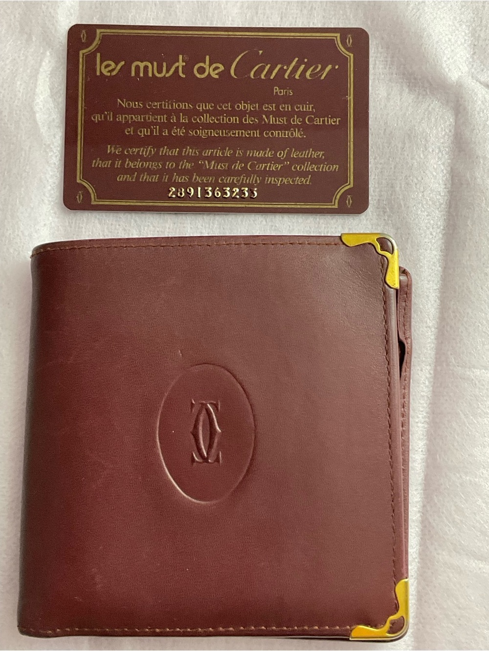 Cartier Burgundy Leather Bifold Wallet with Gold Corners